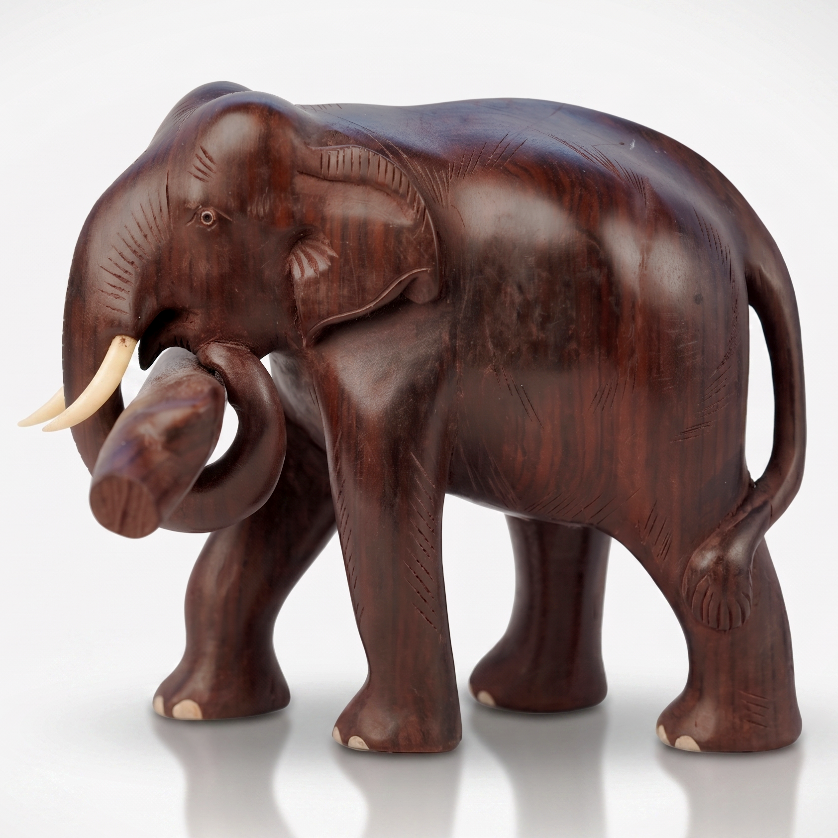 Elephant with log (Rose Wood)