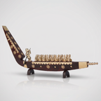 Snake boat with men brass