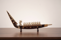 Snake boat with men brass