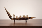 Snake boat with men brass